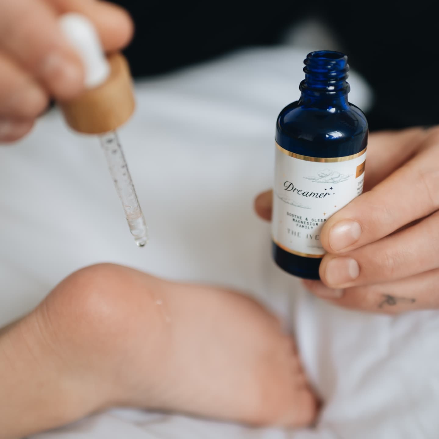 Dreamer, blue glass bottle with magnesium oil essential oils blend for sleep, childrens sleep helper, sleep aid, magnesium lotion, magnesium cream, magnesium butter, massage oil into feet, best essential oils for sleep